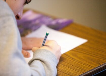 person using pencil